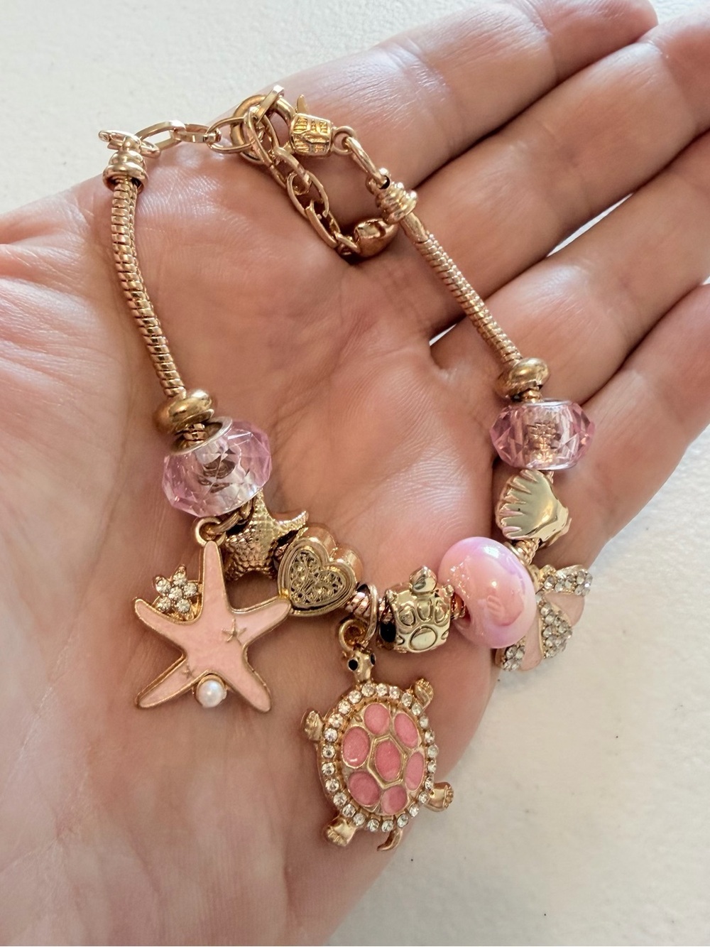 Gold-Tone Pink Sea Charm Bracelet. - Picture 8 of 8